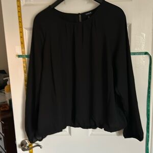 New with tags. Torrid black bubble hem blouse. Torrid size 2 (18/20).